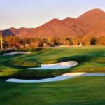 The Gallery at Dove Mountain - View of the mountains from a green on the South Course in the Golf Community in Tucson, Arizona at sunset