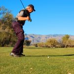 Forty Niner Country Club hitting a golf ball on the course in tucson arizona