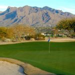 Golf green overlooking the mountains on the OMNI Tucson National Golf Course in Tucson, Arizona