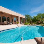 Enjoying the view of the south course at the gallery at dove mountain, poolside in Tucson Arizona